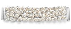 a white pearl and diamond bracelet