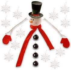 a snowman wearing a top hat and red scarf next to christmas ornaments on a white background