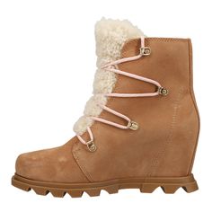 Cool, wet weather calls for warmth - and this wedge has it in spades. Crafted of a waterproof nubuck-and-felt upper, with cozy genuine shearling and microfleece lining, this is the perfect treat-yourself boot. The removable polyurethane-like EVA footbed and rubber sole for non-slip traction makes these boots a cold-weather must. Womens Sorel, Joan Of Arctic Wedge, Sorel Joan Of Arctic, Sorel Joan, Lace Up Booties, Sorel Womens, Wet Weather, Cold Weather, Rubber Sole