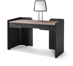 a desk with a mirror on top of it and two drawers underneath the desk is black