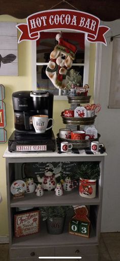 a hot cocoa bar with various types of food on it's display shelf in a kitchen