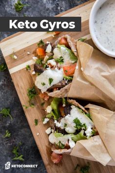 keto gyros on a cutting board with dipping sauce