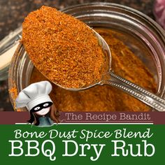 the recipe for bone dust spice blend is in a glass jar with a spoon full of it