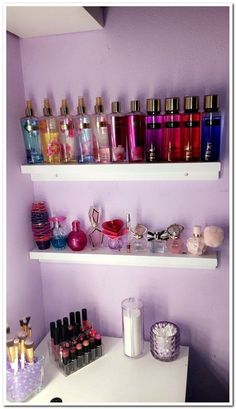 the shelves are filled with different types of perfumes and other personal care products on them