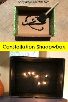 a box with some lights in it and an image of a hand made shadow box