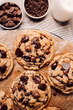 chocolate chip cookies and milk on a table