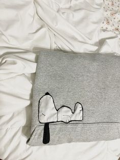 a pillow that has been embroidered onto it