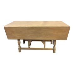 a wooden table with two legs on it