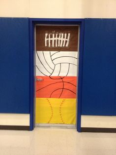 a door decorated with an image of a volleyball ball and the word softball painted on it