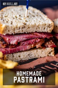 a close up of a sandwich on a plate with the words homemade pastrami