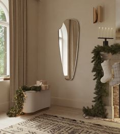 a living room filled with furniture and christmas decorations