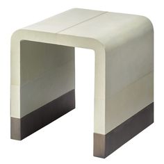 a white and black side table on a white background