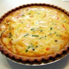 a quiche in a pie pan on a table