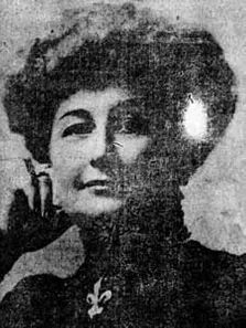 an old black and white photo of a woman talking on a cell phone with her hand up to her ear