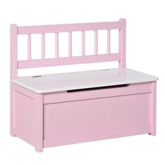 a pink toy chest with a white top and wooden slats on the bottom shelf