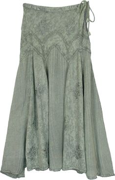 This green pastel-hued skirt is a popular and beautiful piece to get your hand on this season. With just a drawstring you 'control all the strings' on the waist and its comfortable rayon material makes for a great addition to your wardrobe. #tlb #Stonewash #Embroidered #JuniorPetite #Misses #Solid #WesternSkirts #goblincoreskirt #fairyskirt #juniorskirt 70s Hippie Aesthetic, Light Green Skirt, Skirt With Embroidery, Embroidery Green, 70s Skirt, Western Skirts, Gored Skirt, Green Clothing, Fairy Skirt