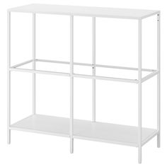 a white shelf with three shelves on each side