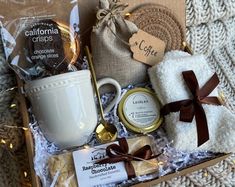 a gift box with coffee, cookies and other items for someone's special occasion