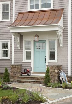 a house with a motorcycle parked in front of it