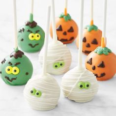 halloween cake pops with faces on them