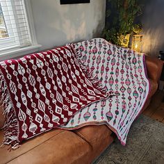 a couch with a blanket on top of it