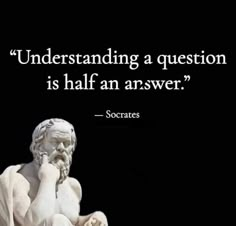 a statue with a quote on it that says,'understanding a question is half an answer? '