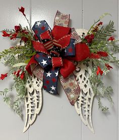 a patriotic bow with red, white and blue decorations