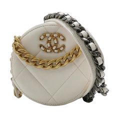 Chanel 19 Round White Cannage Leather bag These are professional photos of the actual bag offered by Luxbags. This super cute Chanel 19 Round White Cannage Leather bag is the perfect accessory for any ensemble! Its gold and silver metal chains give off that effortless glamour we all love, allowing you to stand out in the crowd! So why wait? Add this stylish bag to your wardrobe for an extra bit of pizzazz! Condition: Excellent. Hardly worn. 5"W x 5"H x 2"D 1" handle drop 23" strap drop Manufacture year: 2021 Mini Chanel, Structured Shoulder, Circle Bag, Chanel 19, Professional Photos, Bag Collection, Stylish Bag, Professional Photo, Metal Chain