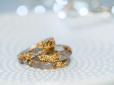 A beautiful gray faceted resin ring with gold flakes inside. This resin ring is perfect for stacking! It's faceted all the way around and it is so comfortable to wear. All my resin rings are handmade with self-made molds. they are also hand-sanded and polished, to be smooth and comfortable to wear. Given the nature of the resin, my rings may contain tiny bubbles and imperfections, but I always try to make them as perfect as possible. The listing is for ONE stacking ring with metal flakes. MEASUR Gold Resin Rings As A Gift, Gold Resin Rings Suitable As A Gift, Gold Resin Rings For Gifts, Gold Resin Rings Perfect For Gifts, Gold Resin Rings For Gift, Gold Minimalist Resin Jewelry, Minimalist Gold Resin Jewelry, Gold Promise Rings With Natural Inclusions, Resin Rings