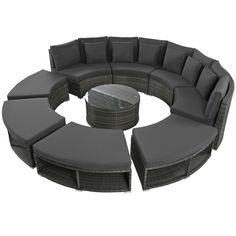 an outdoor furniture set with grey cushions