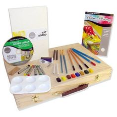 a wooden box with paint, pencils and other art supplies