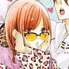 two anime characters with glasses and leopard print on their shirts, one is holding her head