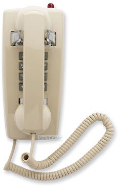 an old style telephone with two handset and one cord attached to the phone, on a white background