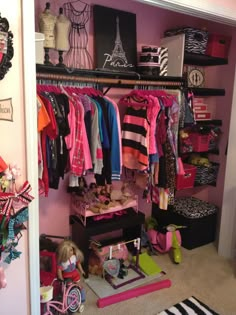 a closet filled with lots of clothes and toys