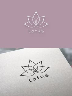 the lotus logo is shown in black and white, with an elegant flower on it