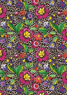 an animal print pattern with flowers and leaves on leopard skin, which is very colorful