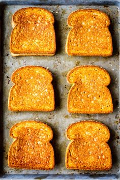 four slices of toasted bread in a pan