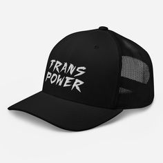 Embroidered hat that reads: TRANS POWER. This six-panel snapback hat with white thread is SPECIFICALLY made for Trans communities. * 60% cotton, 40% polyester * Mid-profile cap with a low-profile embroidery area * Structured, six-panel cap * 3.5″ crown (8.9 cm) * Hard buckram front panels * Mesh back * Permacurv® visor, matching undervisor * Plastic adjustable closure * Head circumference: 21⅝″-23⅝″ (54.9 cm-60 cm) * Blank product sourced from Vietnam or Bangladesh Employee Recognition, Gym Selfie, Los Angeles Style, Gifts For Your Boyfriend, Travel Inspired, A Perfect Day, White Embroidery, Perfect Day, Trucker Cap