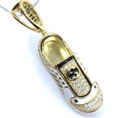 Pump Up The Style With This Exquisite Gg Shoe Pendant Surround With Sparkling Cz Designed In Gold Over Sterling Silver. The Latest Fashion Trend Will Surely Turn Heads When Wearing It. One Of A Kind Stylish Look That You Will Cherish Forever. A Perfect Gift For Any Upcoming Special Occasions. Shoe Pendant, Cute Sneakers, Fashion Trend, Womens Jewelry Necklace, Latest Fashion Trends, Silver Gold, Latest Fashion, Shoes Sneakers, Jewelry Necklaces