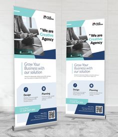 two roll - up banners with the words we are agency and an image of a man sitting