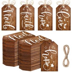 wooden tags with merry new year written on them and tied in twine to each other