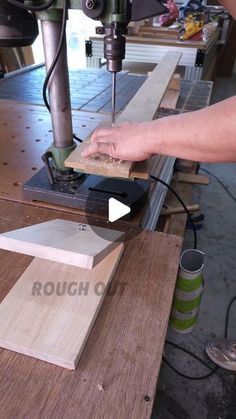 a person using a router to cut wood