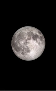 the full moon is seen in the dark sky