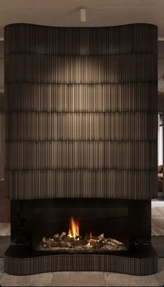 a fire place in the middle of a room