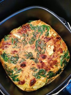 an omelet with spinach and cheese in a crock pot