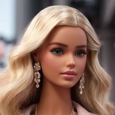 a barbie doll with blonde hair and blue eyes wearing earrings on her head, in front of a mannequin