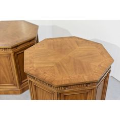 two octagonal wooden tables sitting next to each other