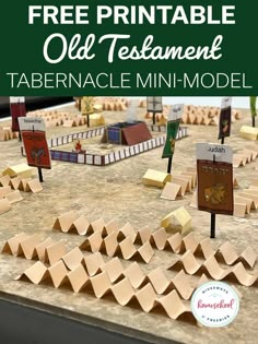 an old - fashioned table with several pieces of paper on it and the title overlay reads, free printable old testament tabernacle mini - model