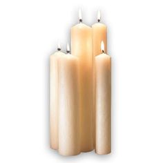 three lit candles are sitting next to each other