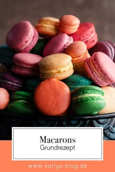 colorful macarons in a bowl with text overlay reading macarons grundrezept